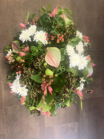 Pink & White Posy - A beautifully handcrafted posy in soft pink, white and fresh green tones, created with seasonal flowers and foliage for a graceful and heartfelt tribute.
